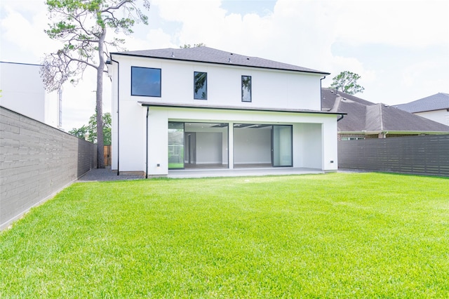 7302 Schiller St, Houston, TX 77055 - back of property with a fenced backyard and stucco siding