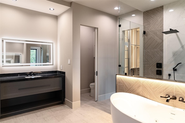 7302 Schiller St, Houston, TX 77055 - full bathroom featuring a stall shower, a soaking tub, vanity, and recessed lighting