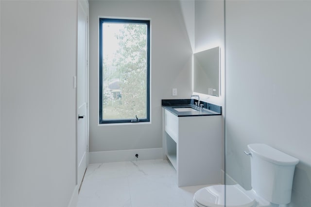 7302 Schiller St, Houston, TX 77055 - bathroom featuring vanity and marble finish floors