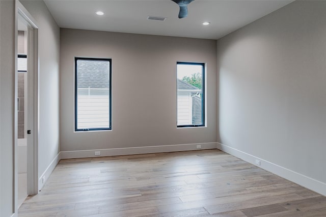7302 Schiller St, Houston, TX 77055 - spare room featuring light wood-style flooring and recessed lighting