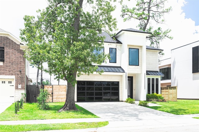 7302 Schiller St, Houston, TX 77055 - view of front facade with a standing seam roof, a garage, driveway, a metal roof, and roof with shingles