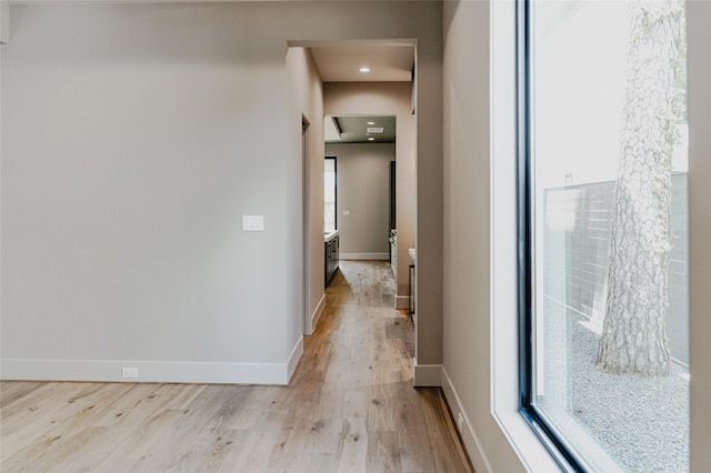 7302 Schiller St, Houston, TX 77055 - hallway with light wood-style flooring and recessed lighting