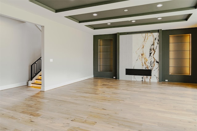 7302 Schiller St, Houston, TX 77055 - spare room featuring wood finished floors, recessed lighting, and stairway