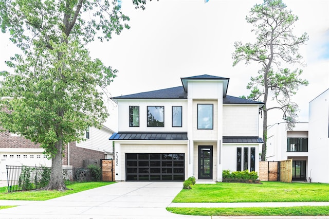 7302 Schiller St, Houston, TX 77055 - contemporary house featuring a standing seam roof, driveway, a garage, and a shingled roof