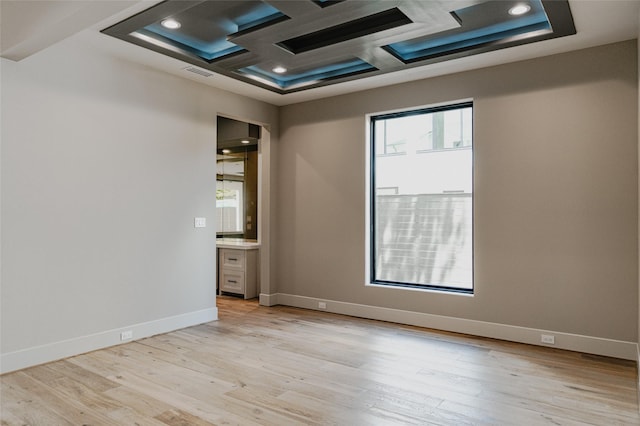 7302 Schiller St, Houston, TX 77055 - spare room featuring coffered ceiling, light wood-style flooring, recessed lighting, and beam ceiling