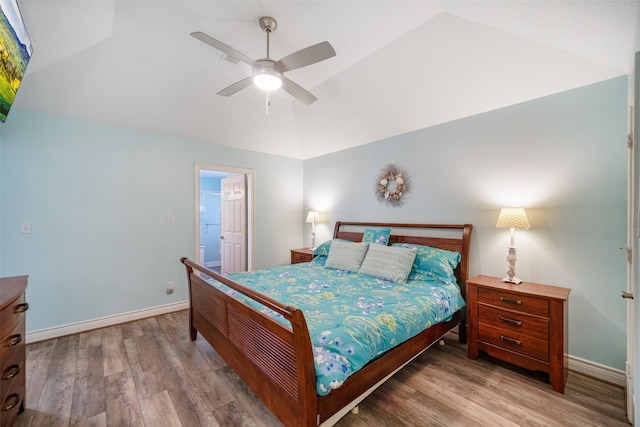 17383 Harbor Dr, Montgomery, TX 77356 - bedroom with vaulted ceiling, wood finished floors, and ceiling fan