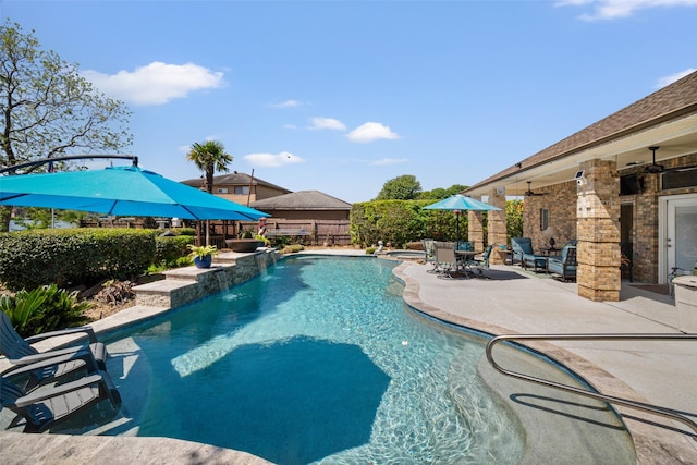 17383 Harbor Dr, Montgomery, TX 77356 - view of swimming pool with a patio area, a ceiling fan, a fenced backyard, and a pool with connected hot tub