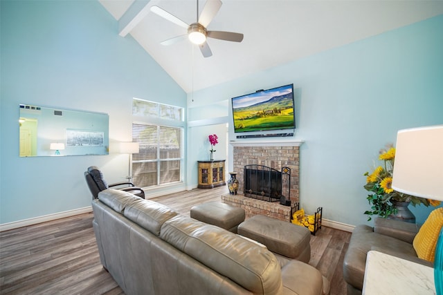 17383 Harbor Dr, Montgomery, TX 77356 - living room with wood finished floors, beamed ceiling, ceiling fan, a fireplace, and high vaulted ceiling