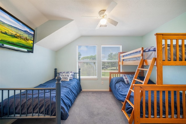 17383 Harbor Dr, Montgomery, TX 77356 - carpeted bedroom featuring vaulted ceiling and a ceiling fan