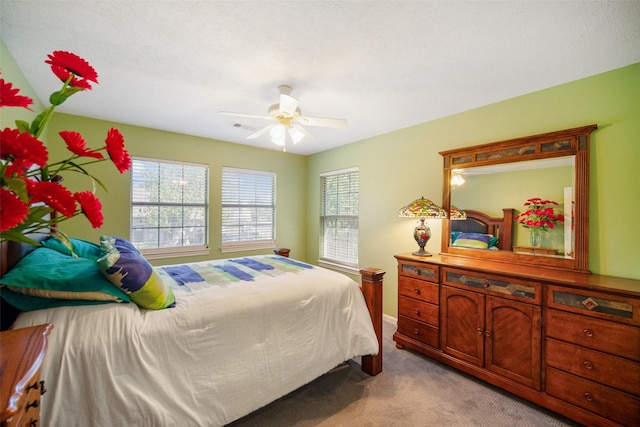 17383 Harbor Dr, Montgomery, TX 77356 - bedroom with light colored carpet and ceiling fan