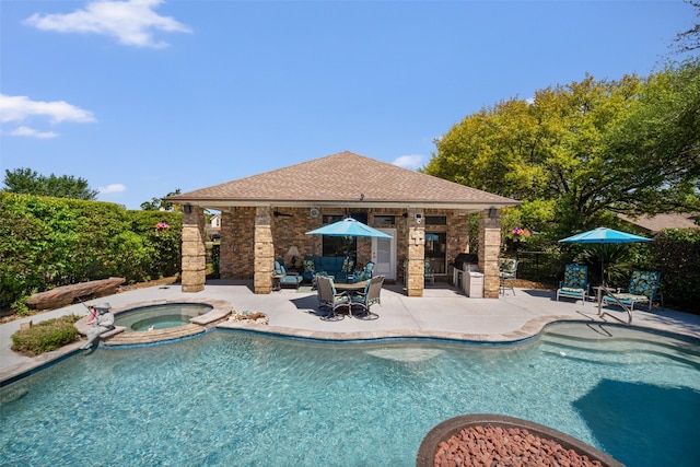 17383 Harbor Dr, Montgomery, TX 77356 - view of swimming pool with a patio area, a storage structure, an outdoor structure, a pool with connected hot tub, and grilling area
