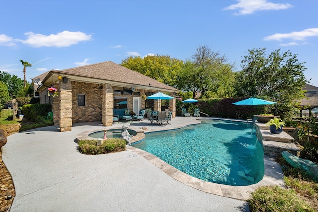 17383 Harbor Dr, Montgomery, TX 77356 - view of swimming pool with a patio, a pool with connected hot tub, and an outdoor structure