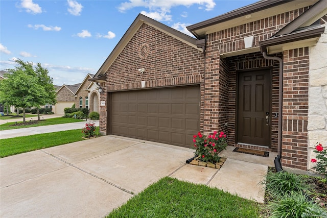 19815 Caprock Falls Ct, Cypress, TX 77433 - view of front of house featuring brick siding, concrete driveway, and a garage