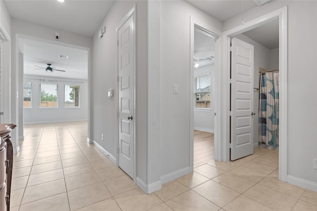 19815 Caprock Falls Ct, Cypress, TX 77433 - hall featuring light tile patterned floors and baseboards