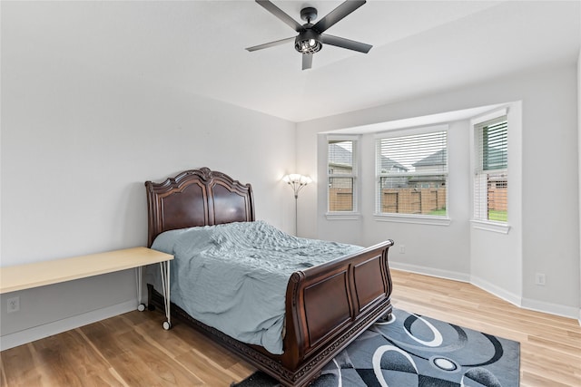 19815 Caprock Falls Ct, Cypress, TX 77433 - bedroom featuring light wood-style floors and ceiling fan