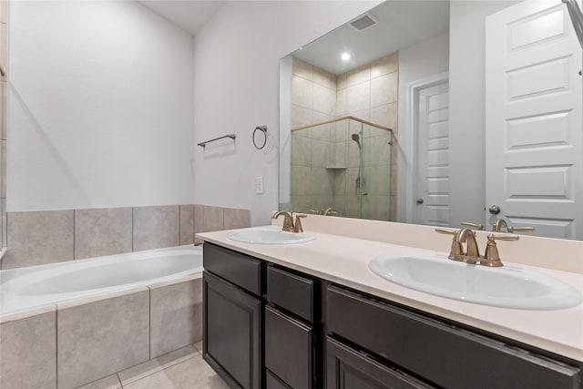 19815 Caprock Falls Ct, Cypress, TX 77433 - full bath with a garden tub, a shower stall, double vanity, and tile patterned flooring