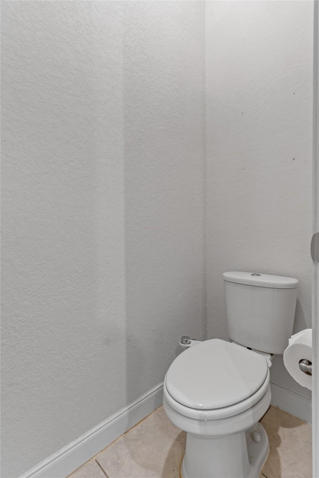 19815 Caprock Falls Ct, Cypress, TX 77433 - bathroom featuring tile patterned flooring and toilet