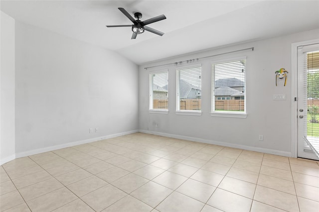 19815 Caprock Falls Ct, Cypress, TX 77433 - spare room featuring healthy amount of natural light, ceiling fan, lofted ceiling, and light tile patterned floors