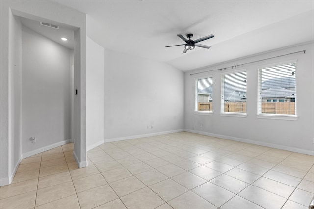 19815 Caprock Falls Ct, Cypress, TX 77433 - spare room featuring light tile patterned floors, a ceiling fan, and lofted ceiling
