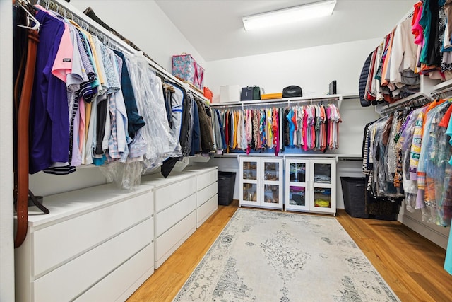 1240 W 16th St, Houston, TX 77008 - walk in closet featuring wood finished floors