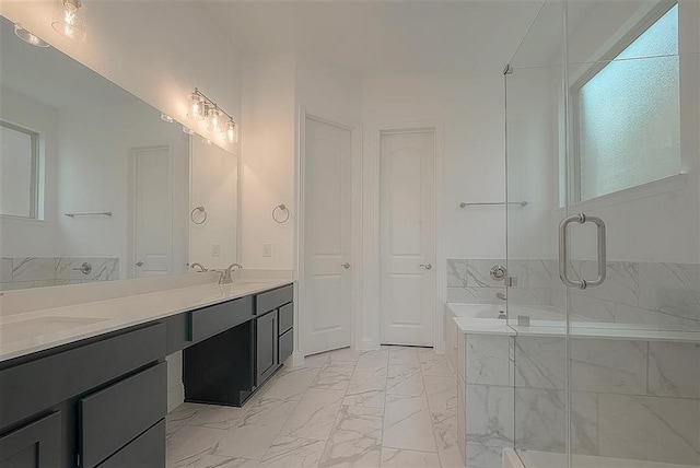 2040 Terra Rose Dr, Katy, TX 77493 - bathroom featuring marble finish flooring, double vanity, a garden tub, and a stall shower