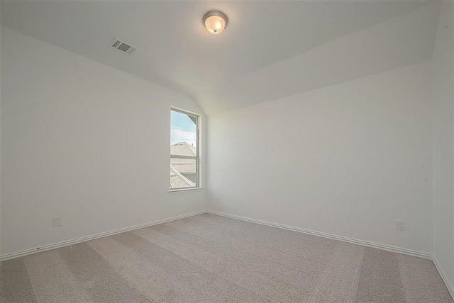 2040 Terra Rose Dr, Katy, TX 77493 - carpeted spare room with lofted ceiling and baseboards