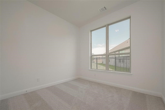2040 Terra Rose Dr, Katy, TX 77493 - spare room with light carpet and vaulted ceiling
