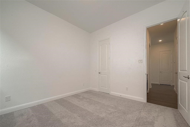 2040 Terra Rose Dr, Katy, TX 77493 - carpeted empty room with vaulted ceiling and baseboards