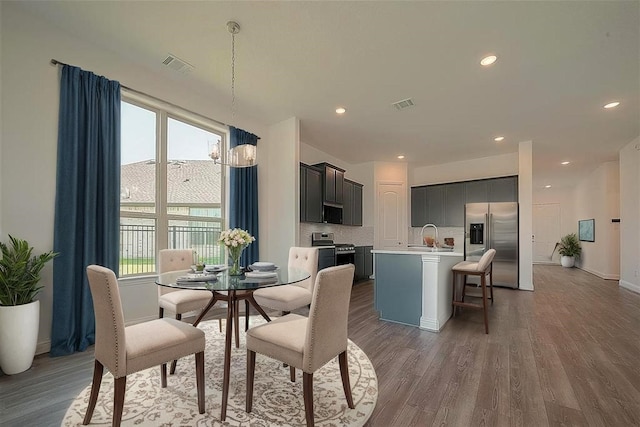 2040 Terra Rose Dr, Katy, TX 77493 - dining area featuring wood finished floors and recessed lighting