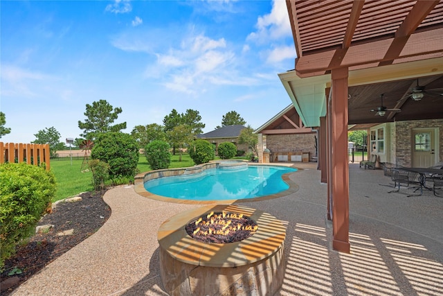 3211 Lakes Of Katy Ln, Katy, TX 77493 - outdoor pool with a ceiling fan, an outdoor fire pit, and a patio area
