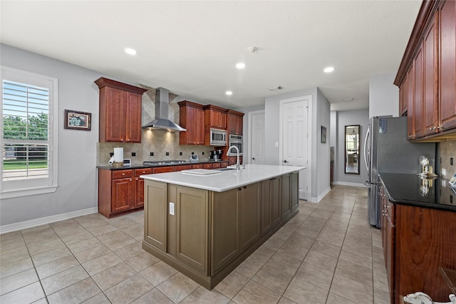 3211 Lakes Of Katy Ln, Katy, TX 77493 - kitchen with wall chimney exhaust hood, light tile patterned flooring, stainless steel appliances, tasteful backsplash, and recessed lighting