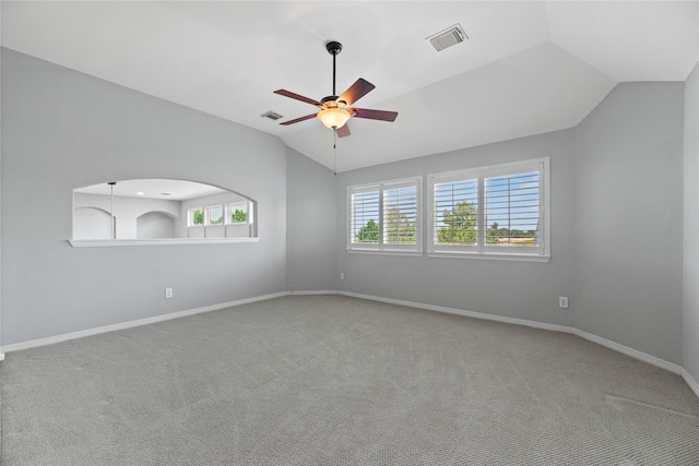 3211 Lakes Of Katy Ln, Katy, TX 77493 - carpeted spare room with vaulted ceiling and a ceiling fan