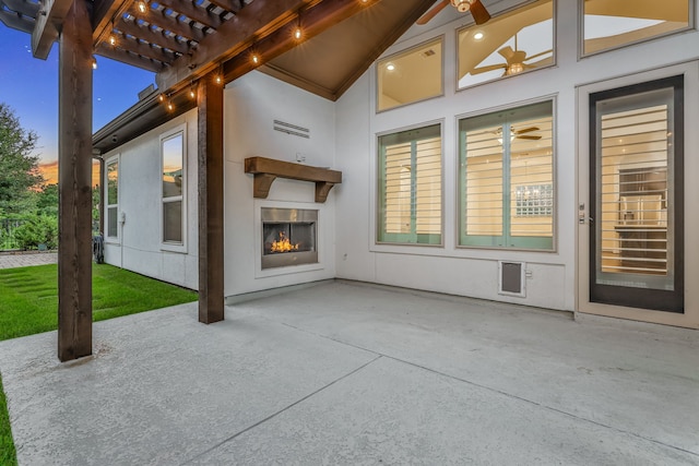 15 Floral Hills Ln, Fulshear, TX 77441 - view of patio / terrace featuring a warm lit fireplace and a pergola