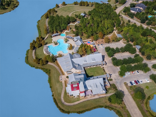 15 Floral Hills Ln, Fulshear, TX 77441 - aerial overview of property's location featuring a pool area and a large body of water