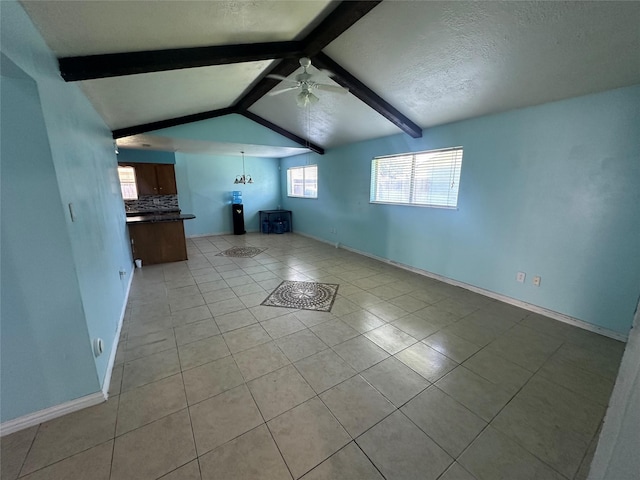 4522 Sage Cir, Baytown, TX 77521 - unfurnished living room with a ceiling fan, light tile patterned floors, and a textured ceiling