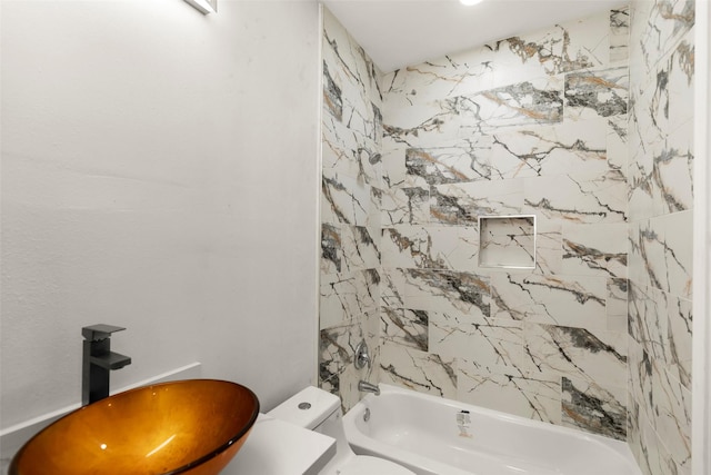4817 Los Angeles St, Houston, TX 77026 - full bathroom with a sink and bathing tub / shower combination