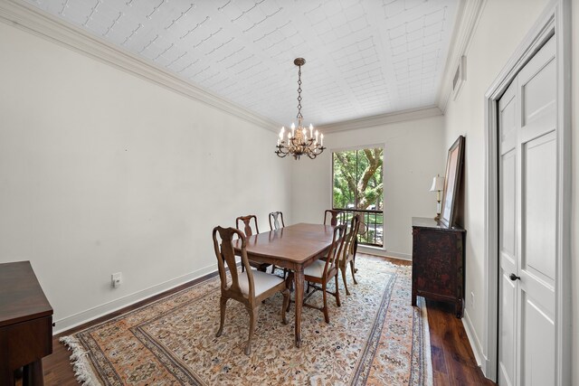 9 Farther Pt, Houston, TX 77024 - dining area featuring a chandelier, dark wood-type flooring, and ornamental molding