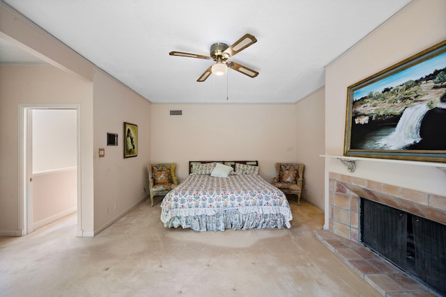 9 Farther Pt, Houston, TX 77024 - bedroom with carpet flooring, a stone fireplace, and ceiling fan