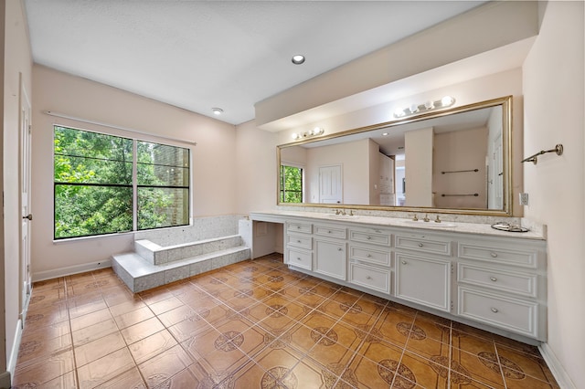 9 Farther Pt, Houston, TX 77024 - bathroom with double vanity, tile patterned floors, and a tub