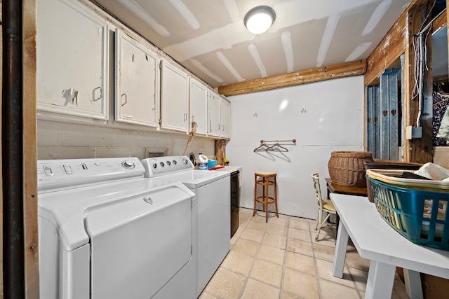 9 Farther Pt, Houston, TX 77024 - laundry room featuring cabinet space and washing machine and dryer