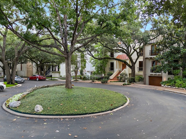 9 Farther Pt, Houston, TX 77024 - view of home's community featuring stairway