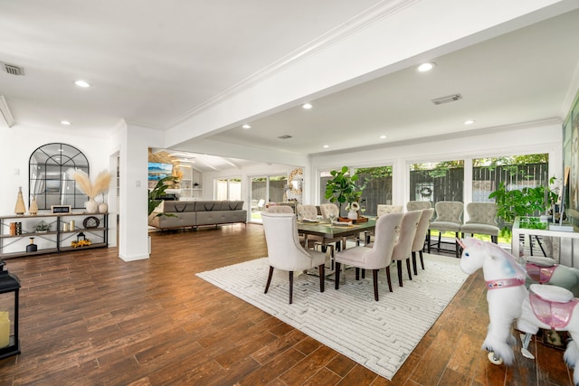 12422 Cobblestone Dr, Houston, TX 77024 - dining space featuring crown molding, wood finished floors, plenty of natural light, recessed lighting, and beam ceiling
