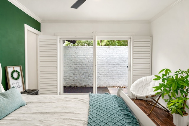 12422 Cobblestone Dr, Houston, TX 77024 - bedroom featuring wood finished floors, crown molding, and a ceiling fan