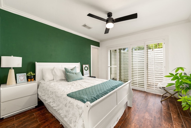 12422 Cobblestone Dr, Houston, TX 77024 - bedroom featuring dark wood-style flooring, crown molding, a ceiling fan, and access to exterior