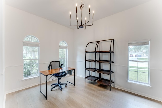 17814 Placid Oak Ct, Cypress, TX 77433 - office space with a chandelier and light wood-style floors