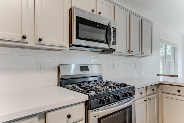17814 Placid Oak Ct, Cypress, TX 77433 - kitchen with appliances with stainless steel finishes, light countertops, and backsplash