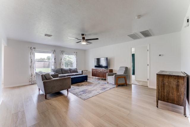 17814 Placid Oak Ct, Cypress, TX 77433 - living area featuring a ceiling fan and light wood-style floors