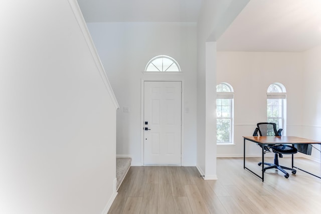 17814 Placid Oak Ct, Cypress, TX 77433 - foyer entrance featuring light wood-type flooring and baseboards