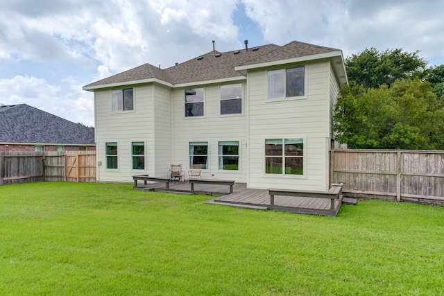 17814 Placid Oak Ct, Cypress, TX 77433 - back of property featuring a fenced backyard, a deck, and a shingled roof