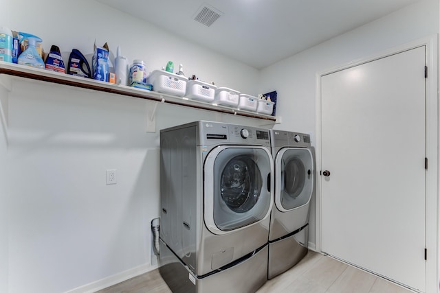 17814 Placid Oak Ct, Cypress, TX 77433 - washroom with washer and dryer